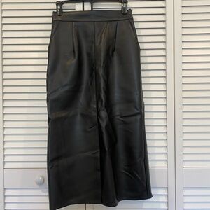 Oak + Fort vegan leather midi skirt with a middle slit.